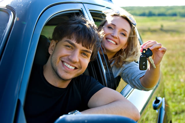 couple in new car